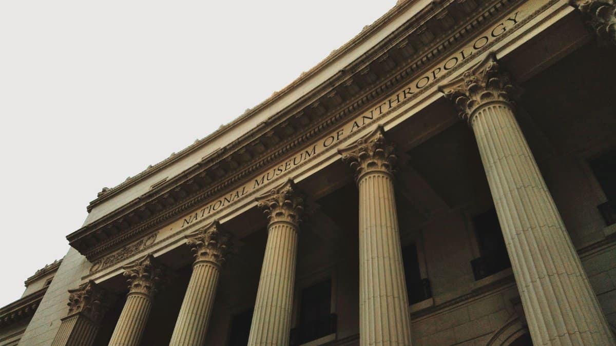 Low angle view of the historic neoclassical facade of the National Museum of Anthropology.
