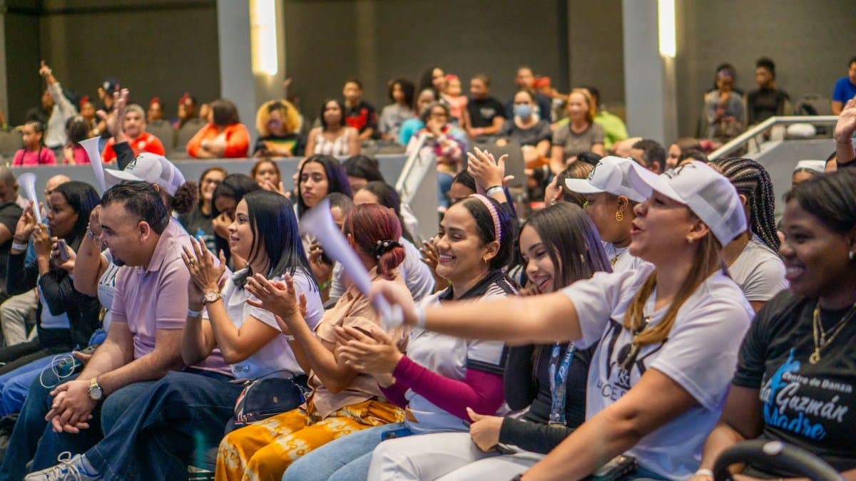 A lively crowd enjoying a cultural event in the Dominican Republic, showcasing local celebrations.