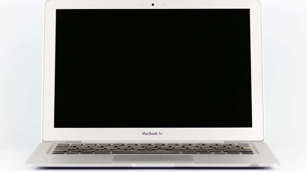Front view of a MacBook Air laptop with a blank screen on a white background.