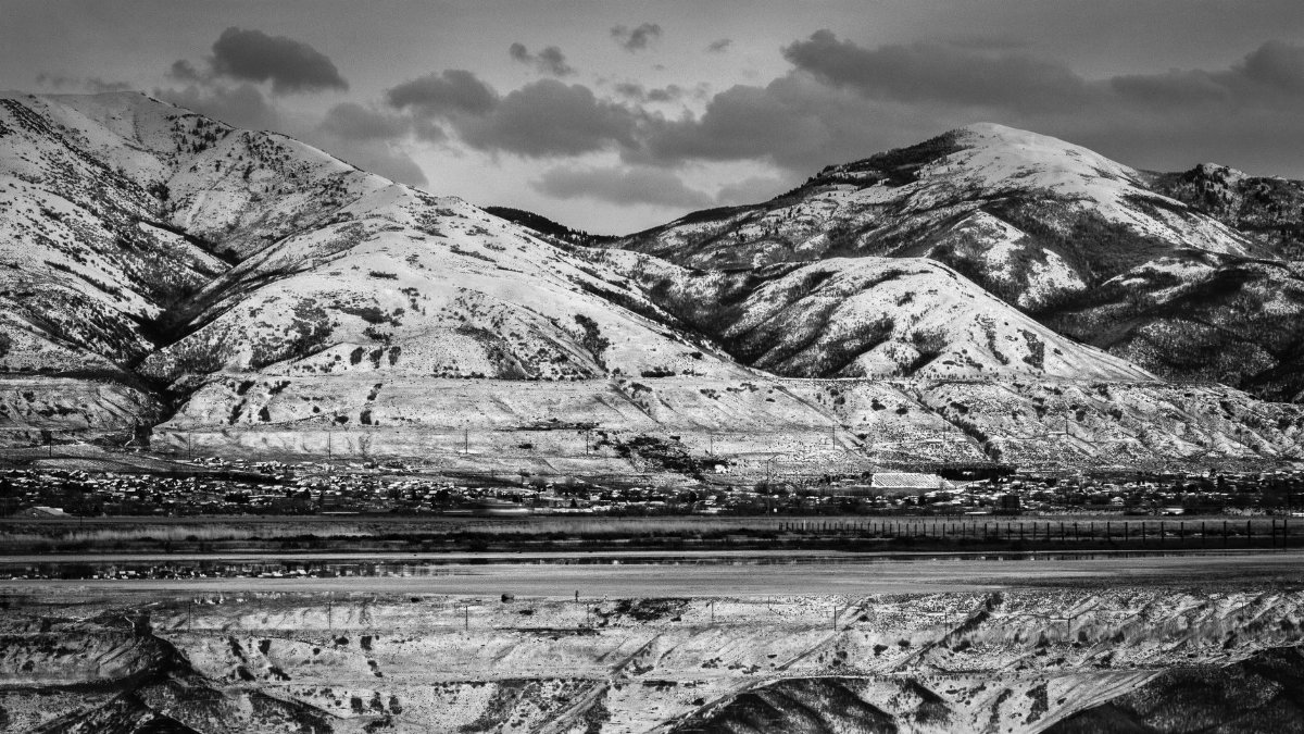 Scenic view of snow-covered mountains with reflections in Brigham City, Utah.
