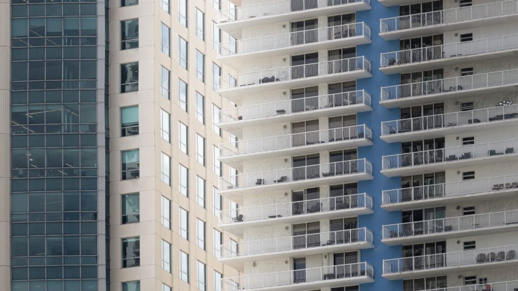 Close-up view of modern high-rise building facades in Miami, Florida, showcasing urban architecture.