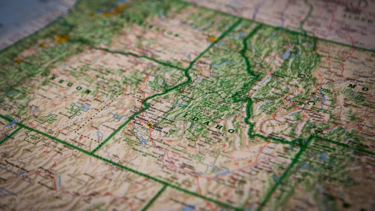 Close-up of a detailed topographic map highlighting Idaho and its surrounding regions.