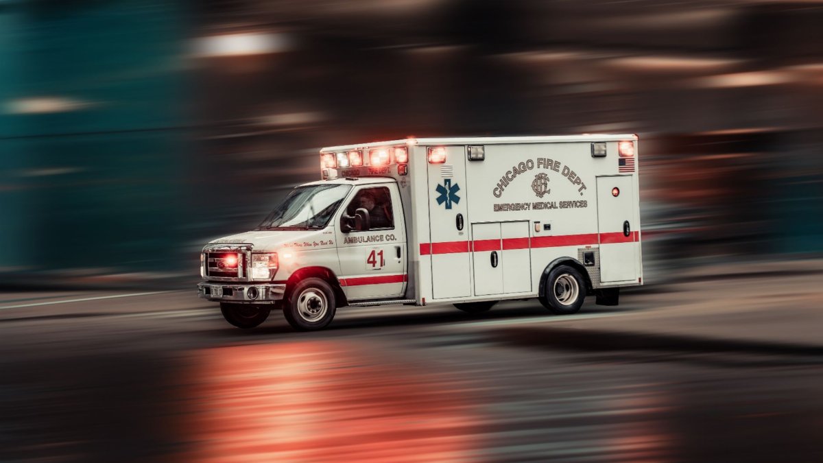 Dynamic capture of a Chicago Fire Dept ambulance rushing through city streets.
