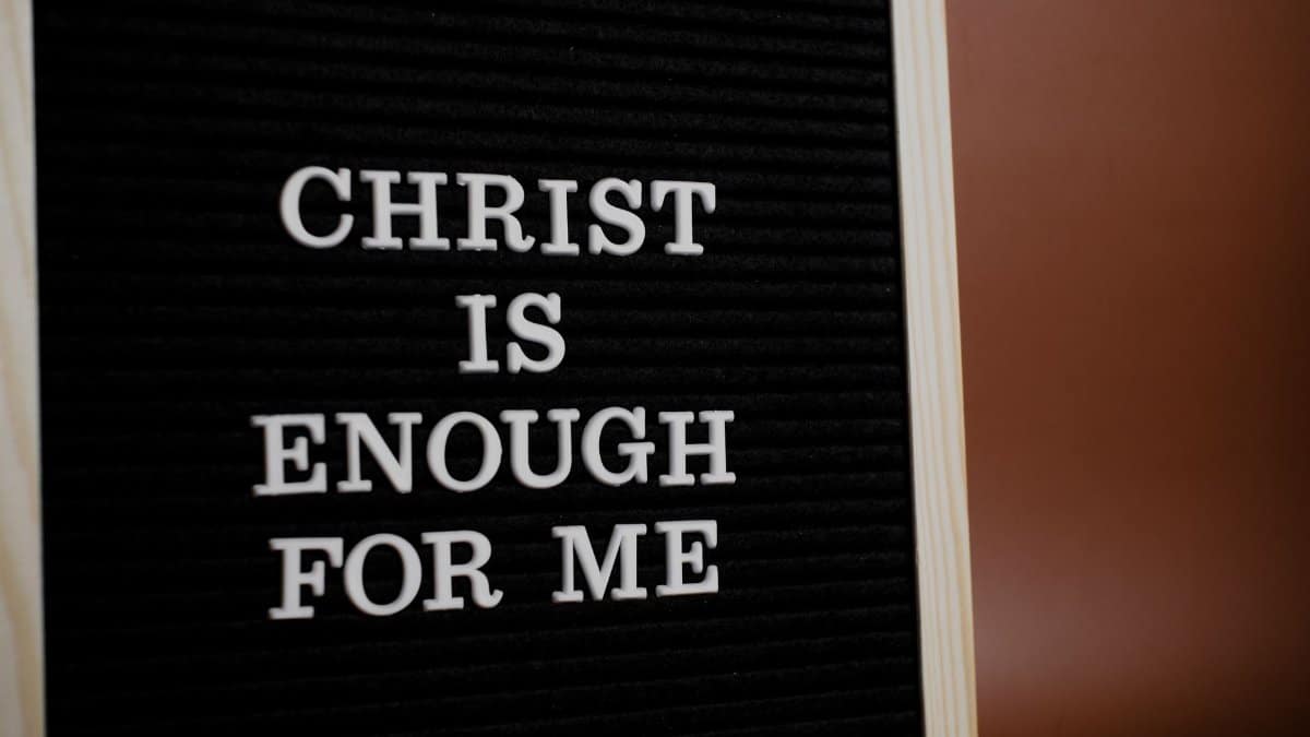 Close-up of an inspirational Christian message on a letter board expressing faith.