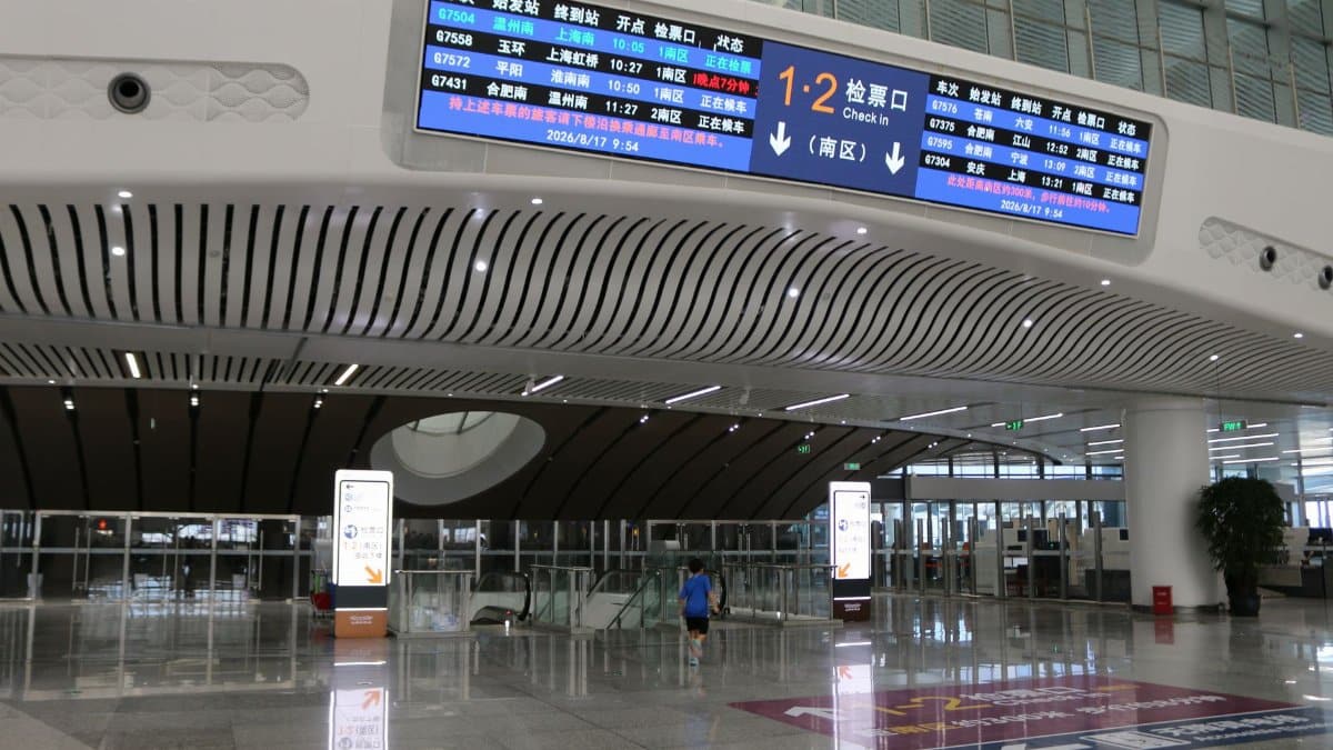 View of the futuristic interior design in Shanghai's railway station showcasing modern architecture.