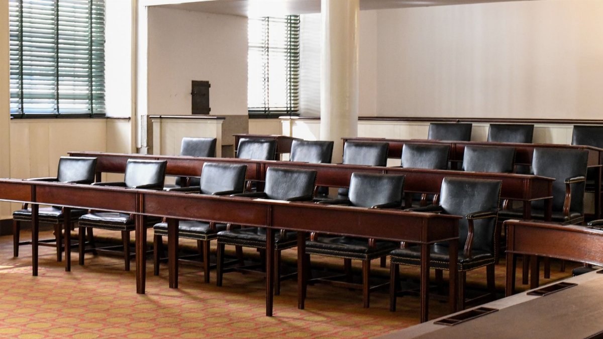 Empty Congress Hall chamber with classic wooden seating in Philadelphia's historic landmark.