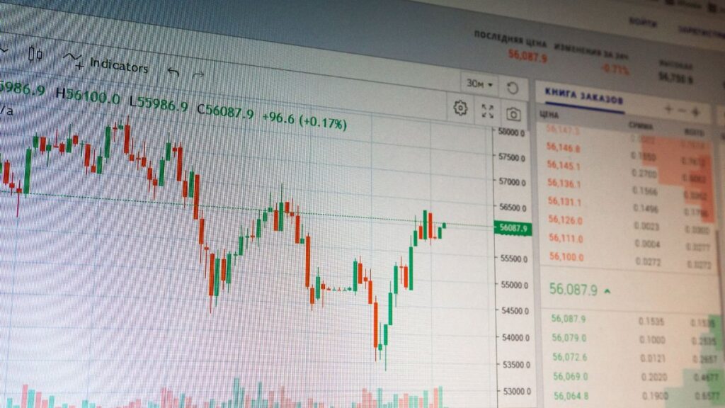 Close-up of digital cryptocurrency market graph showing price fluctuations and trading data.