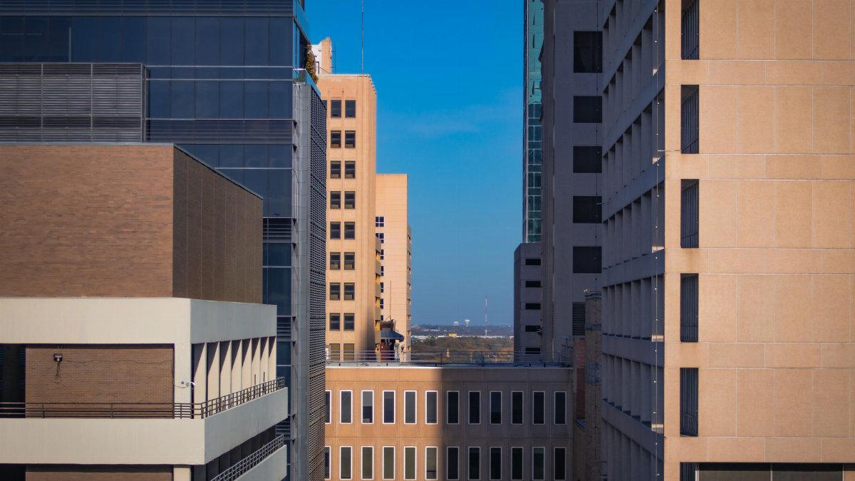 Stunning cityscape of Fort Worth, Texas featuring modern architecture and a clear blue sky.
