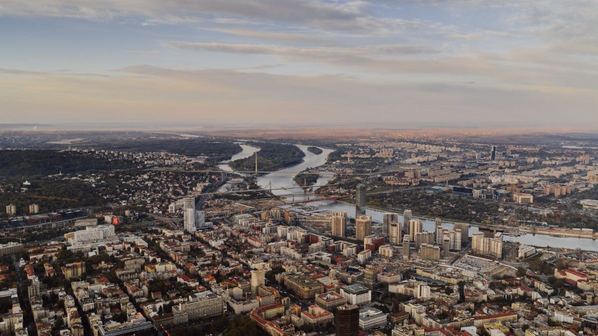 Stunning aerial view of Belgrade, Serbia, featuring the city's skyline and rivers.