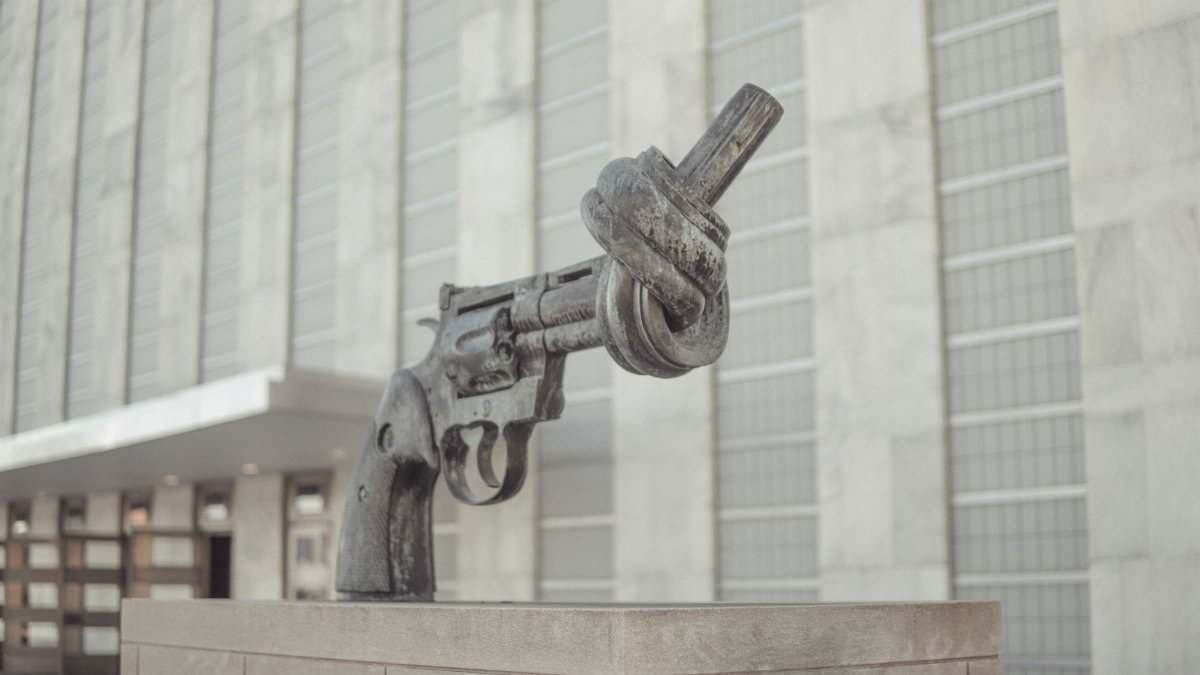 A symbolic sculpture of a knotted gun promoting non-violence at the United Nations in NYC.