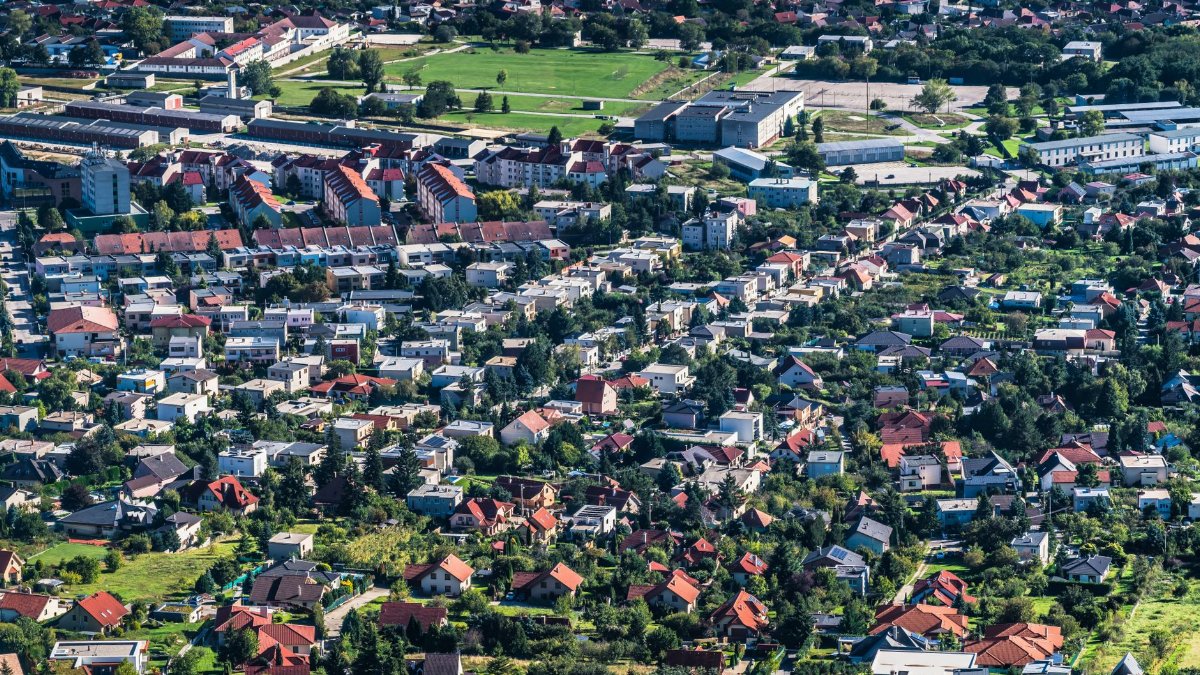 Scenic aerial view of Nitra, Slovakia showcasing urban landscape and greenery.