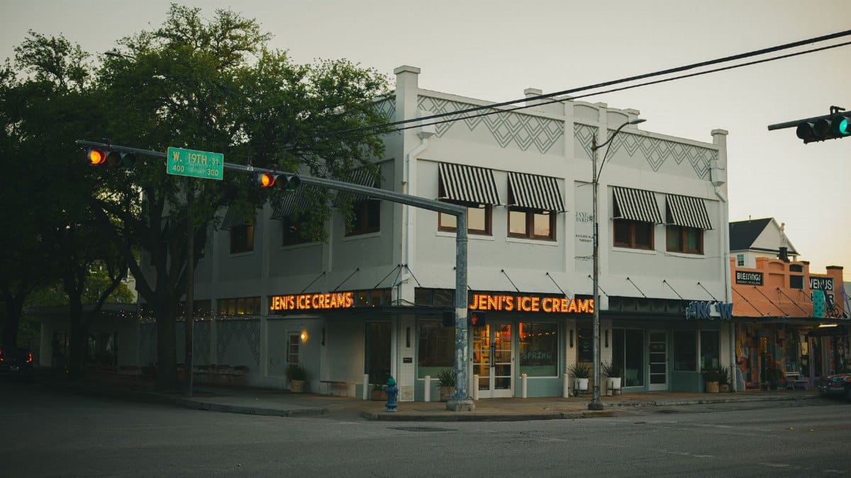 A classic ice cream shop with neon lights under evening sky in Houston, Texas.