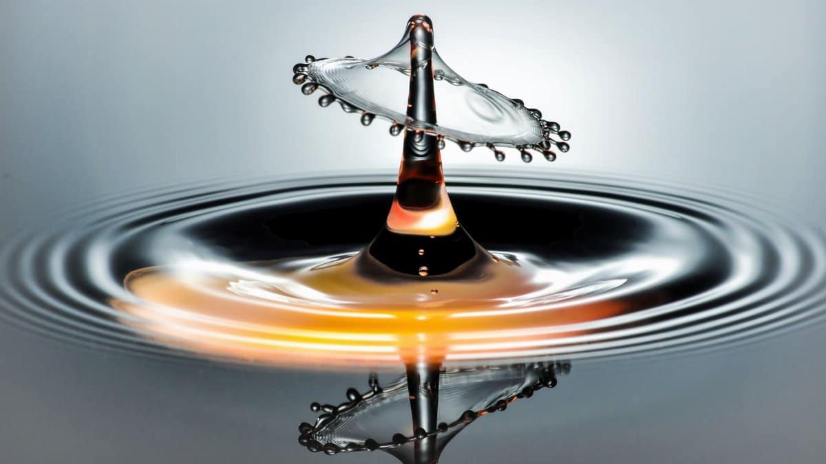 Captivating macro shot of a water droplet collision creating a unique abstract design.