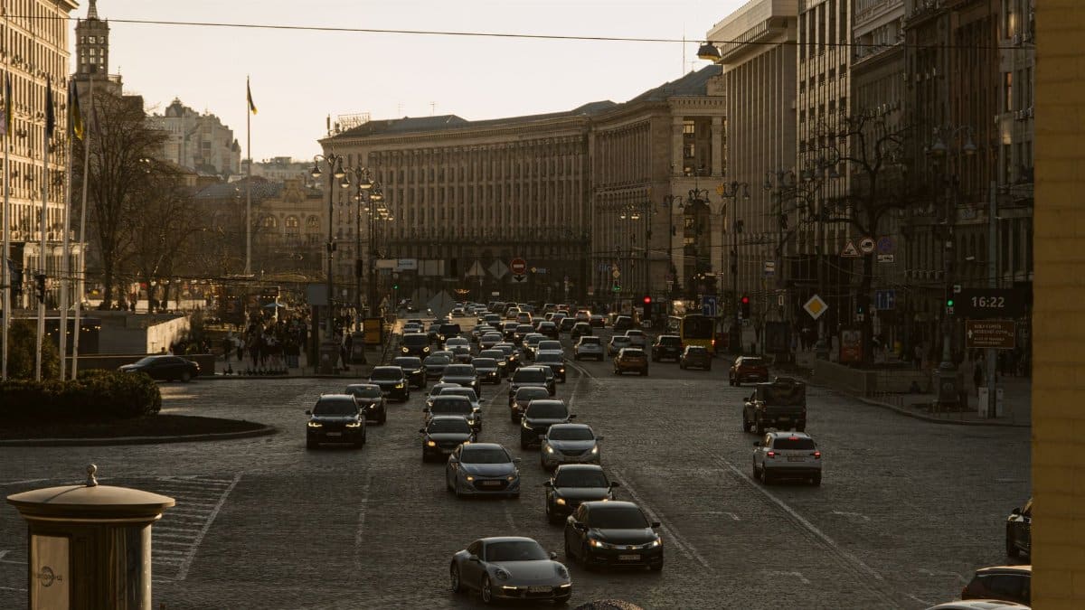 Heavy traffic on Khreshchatyk Street in Kyiv city, Ukraine during the day, offering an urban scene.