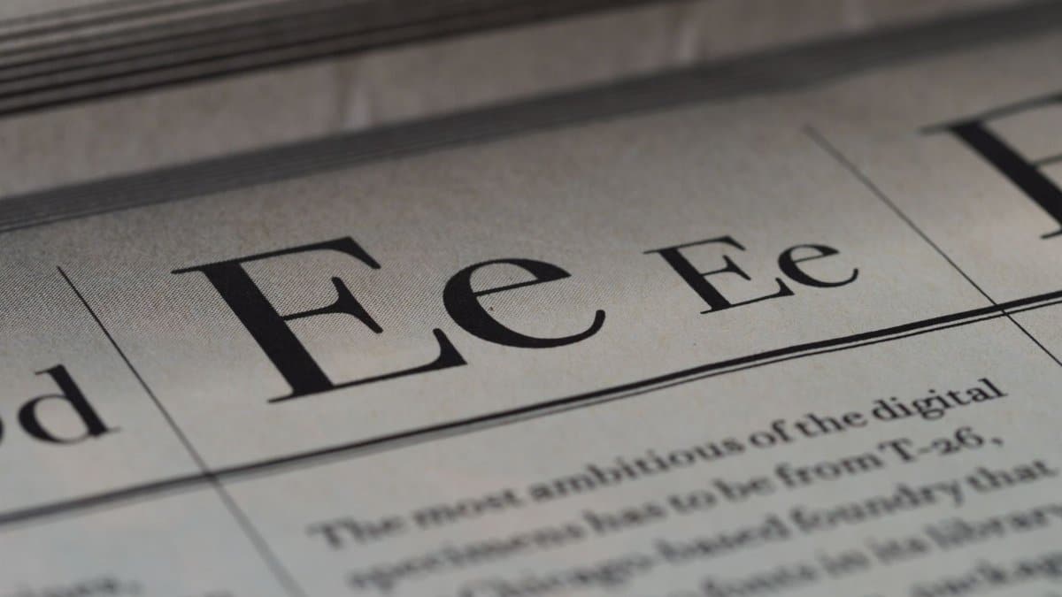 Artistic close-up of typography on newspaper with selective focus.