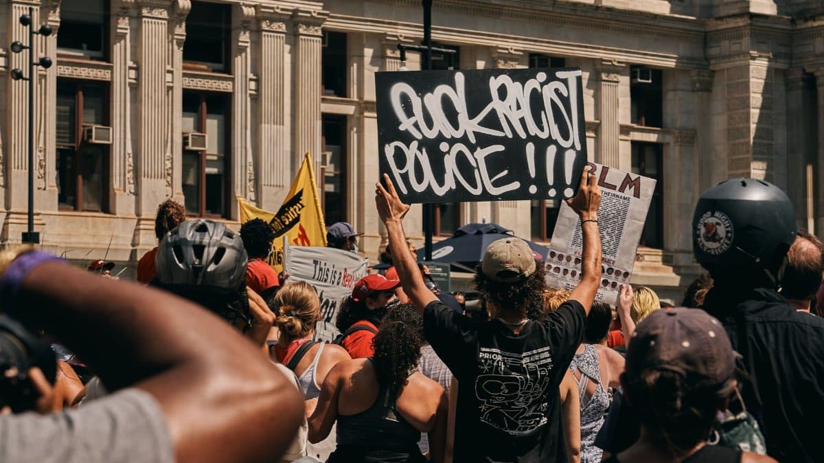 Protesters rally in Philadelphia advocating against police racism and supporting BLM.