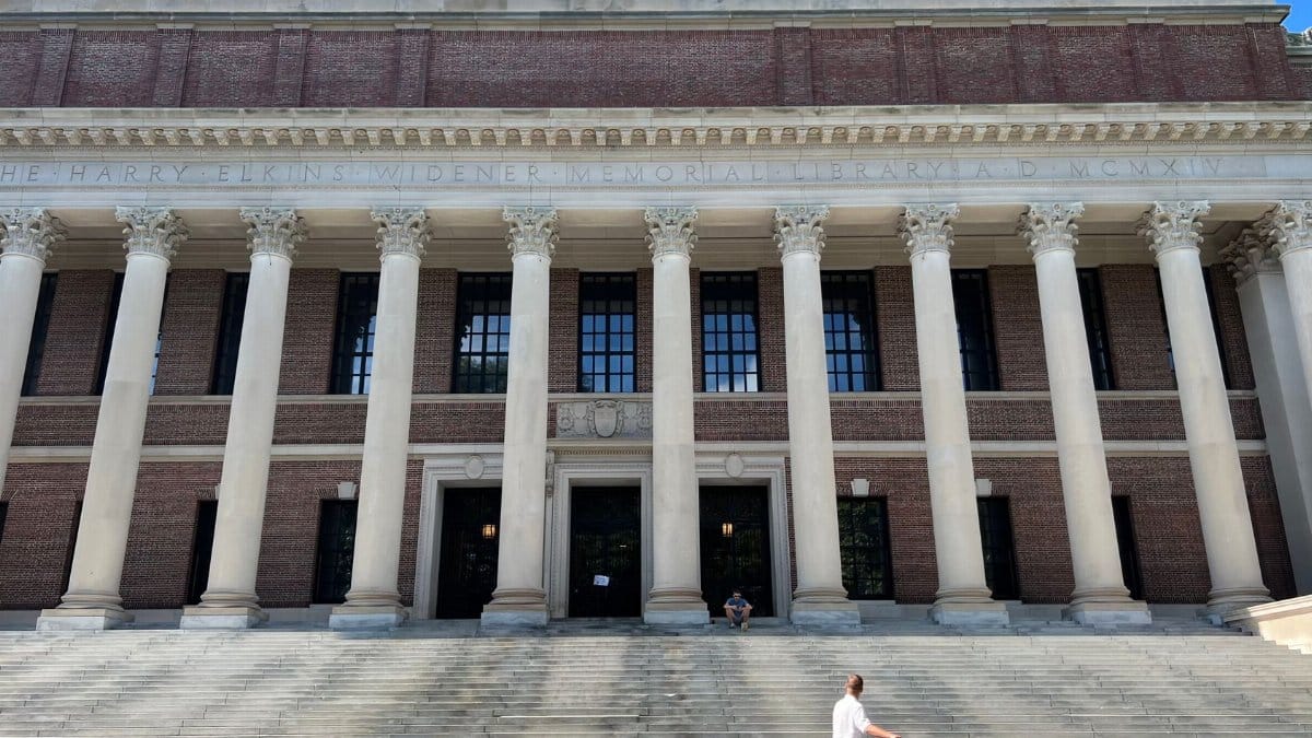 Harvard University's iconic Widener Library with cyclist in front, Cambridge, MA.