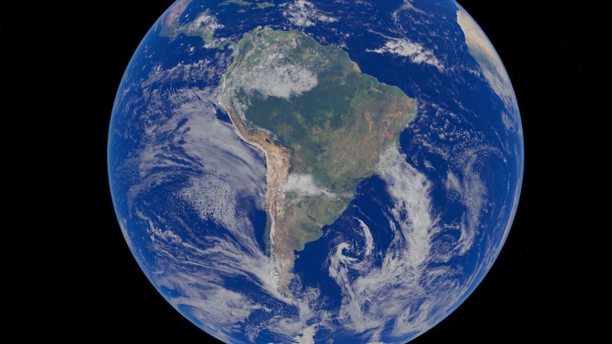 Stunning satellite image of Earth focusing on the South American continent with clear blue oceans visible.