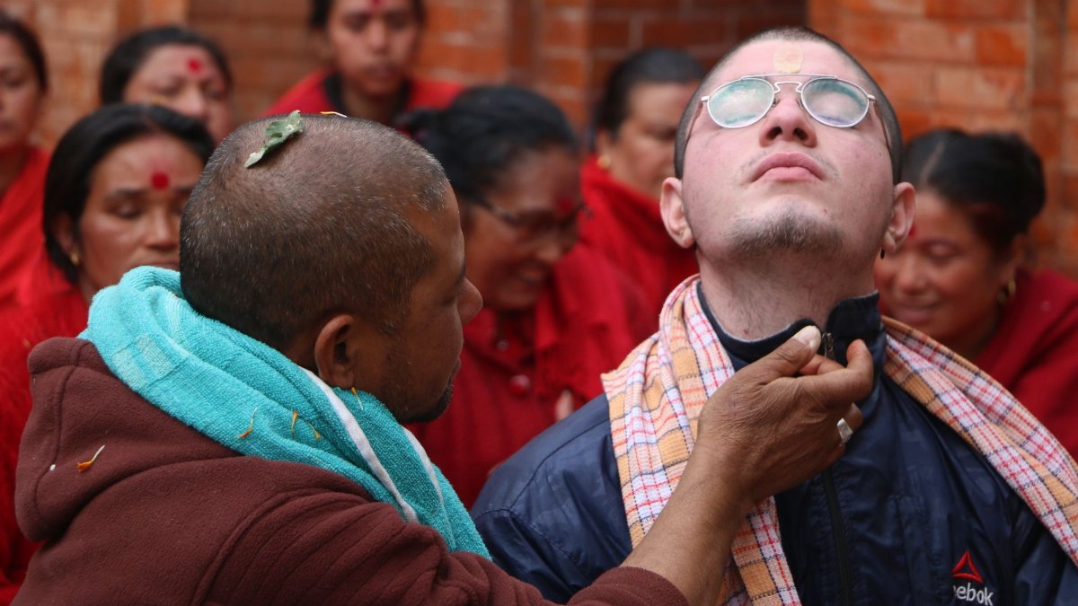 Devotional ceremony in Sankhu, Nepal depicting a traditional healing ritual.