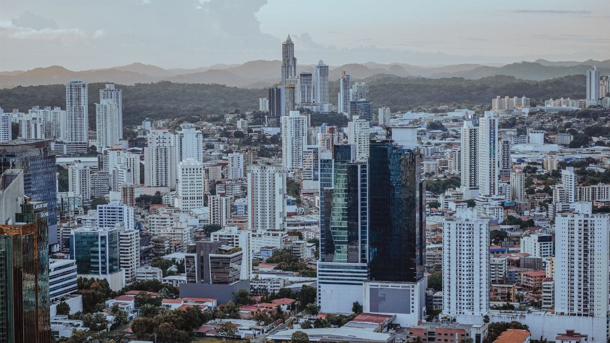 Aerial view of Panama City's bustling skyline featuring modern skyscrapers and urban architecture.