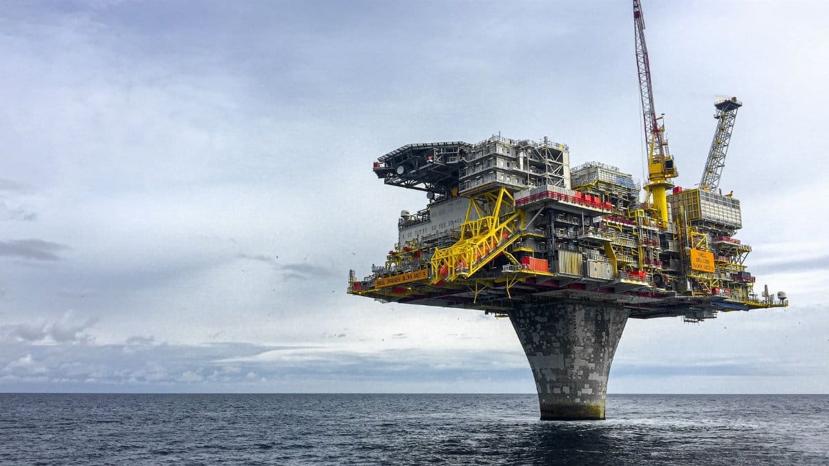Dramatic view of a large oil platform in Norway's North Sea, symbolizing offshore industry.