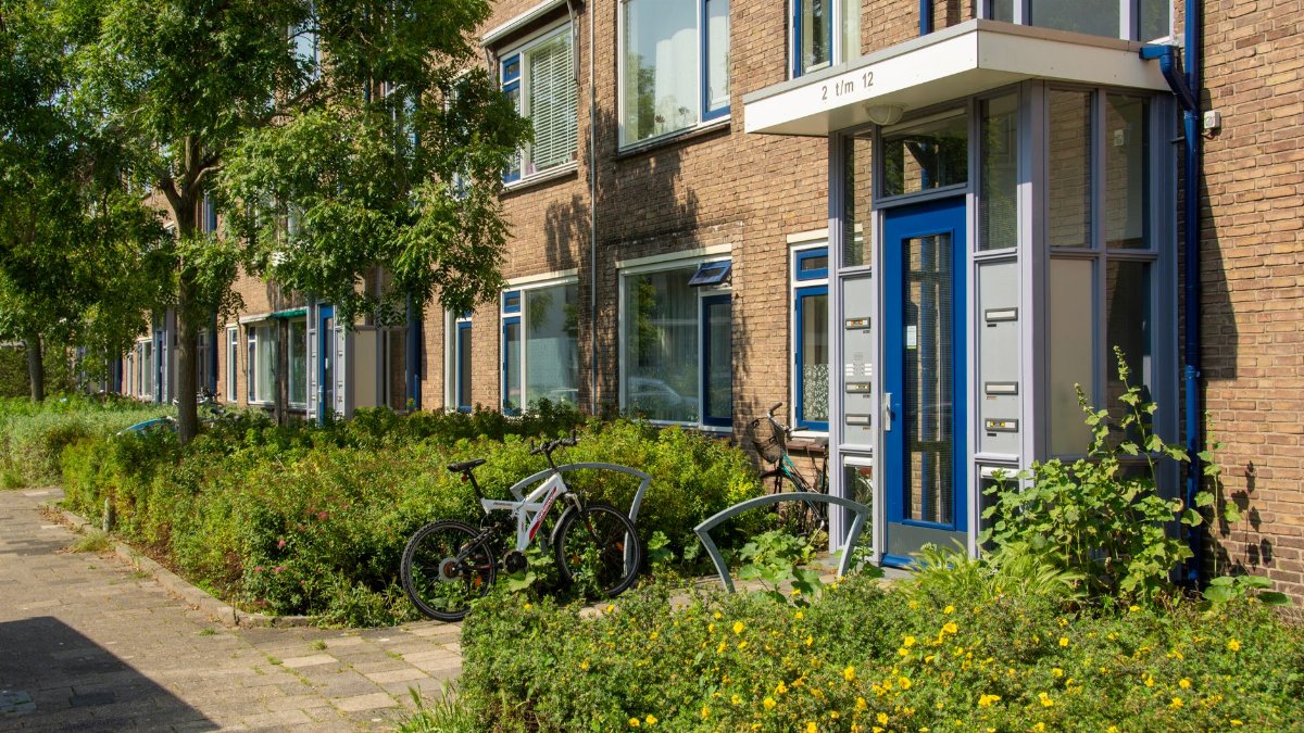 Charming Dutch apartment exterior with bikes in Voorburg, Zuid-Holland.