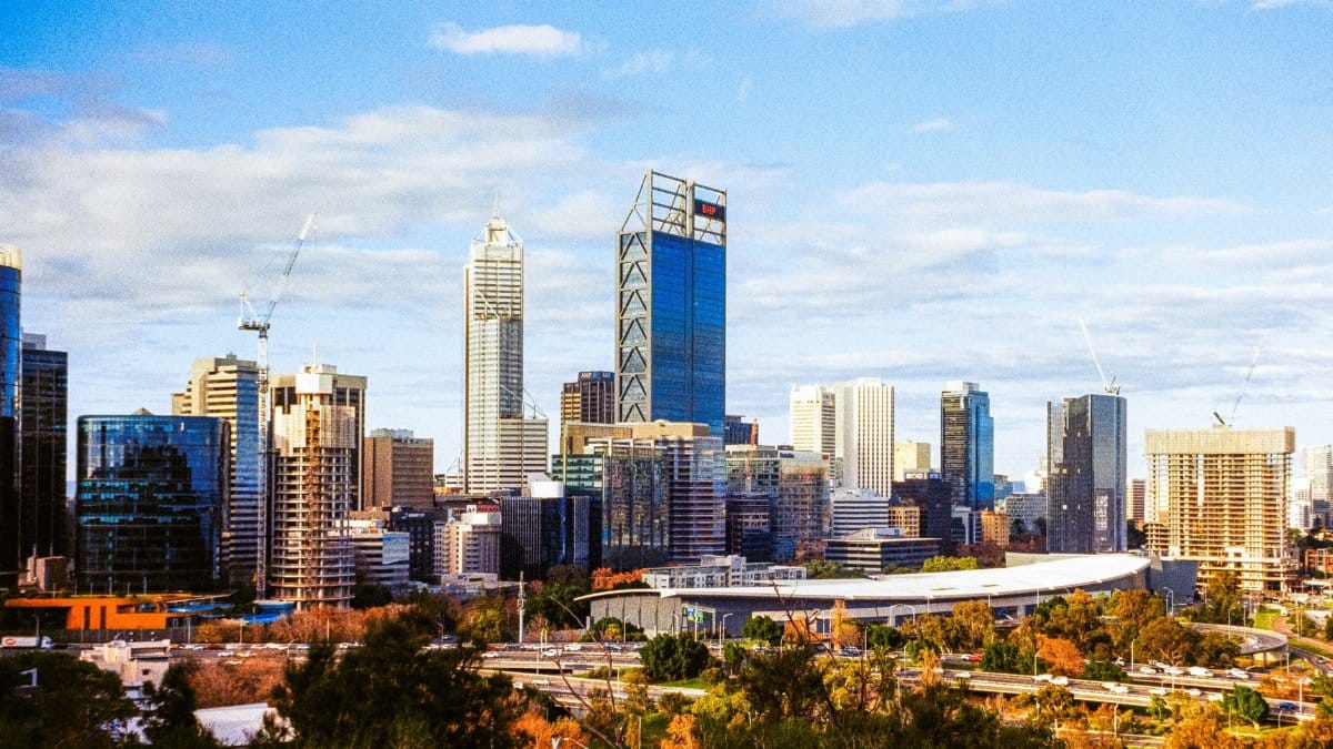 A captivating aerial view of Perth's cityscape featuring modern skyscrapers and urban architecture.