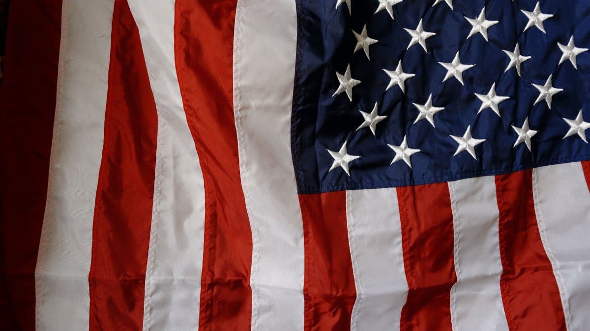 Detailed view of the United States flag showcasing stars and stripes representing national pride.