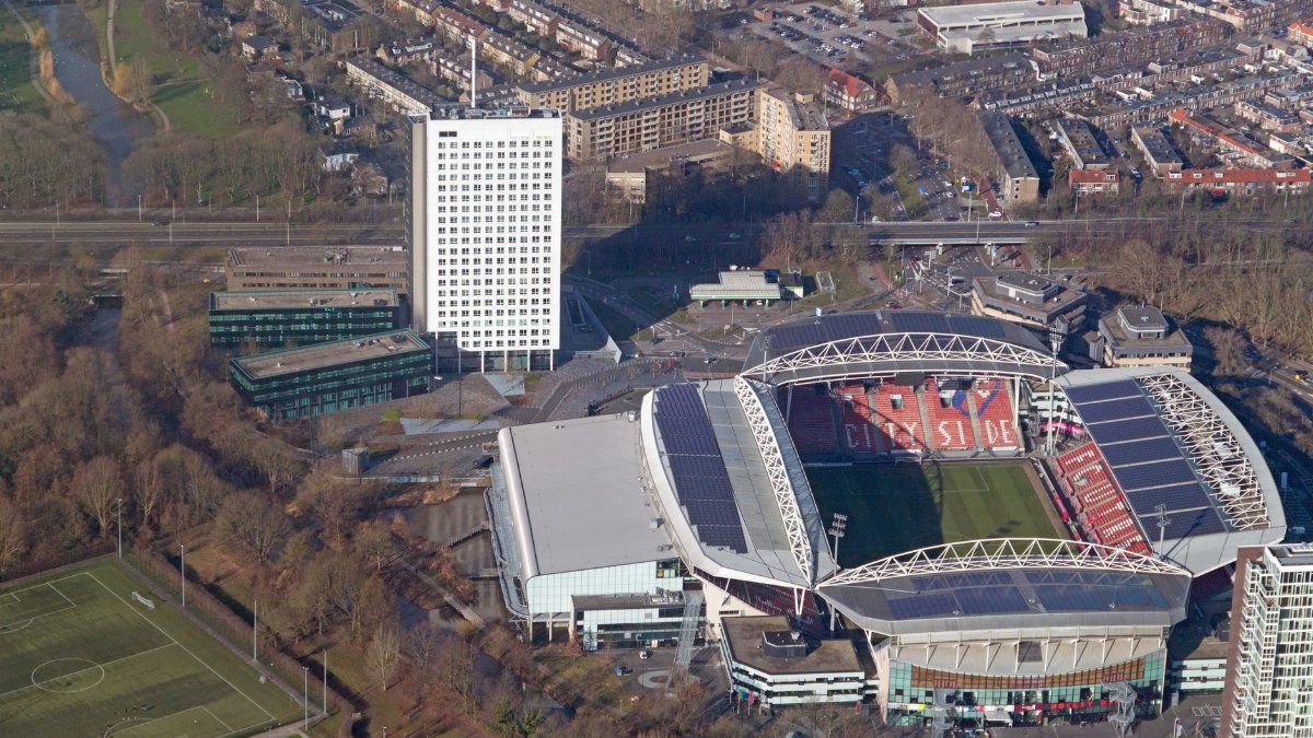 High-angle view of Galgenwaard Stadium and surrounding urban landscape in Utrecht, Netherlands.