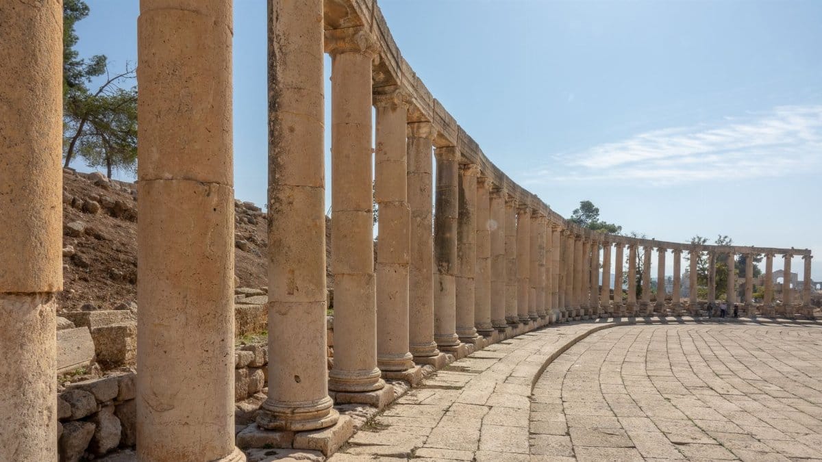 Explore the ancient Roman colonnaded street of Jerash, a historical site in Jordan.