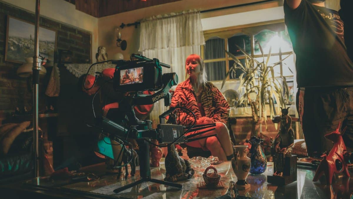 Cozy home film set featuring a camera and crew during a shoot in Rengo, Chile.