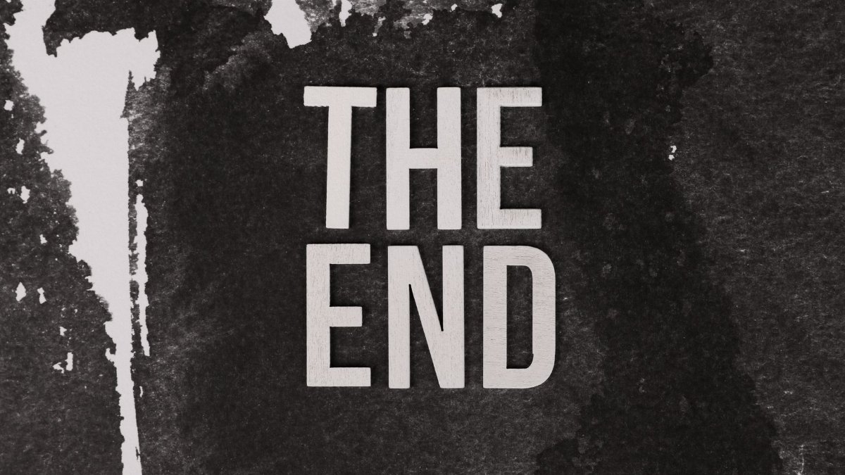 Black and white artistic image featuring 'The End' text with textured background.