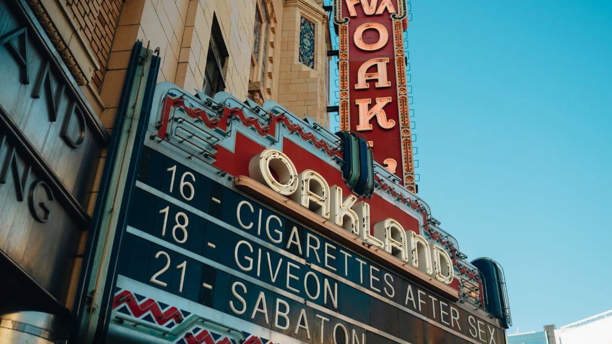 Exterior shot of the Fox Theater marquee in Oakland, California featuring upcoming events.