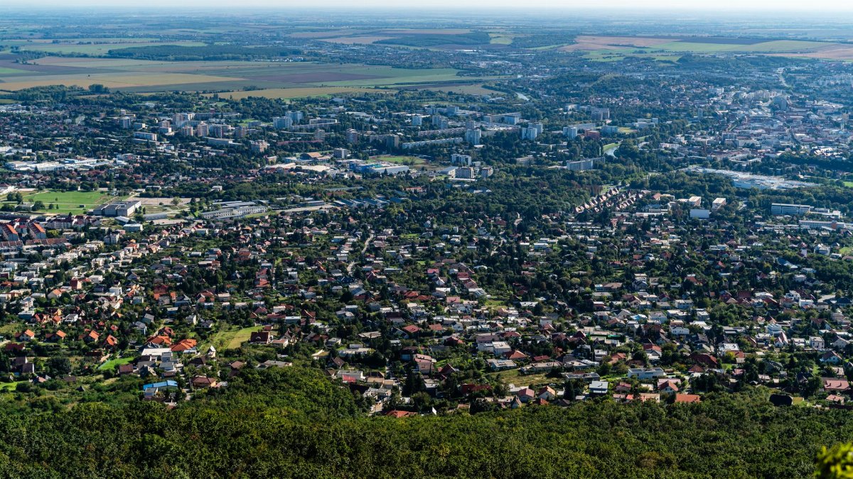 Breathtaking aerial view of Nitra, Slovakia showcasing its urban landscape and surrounding nature.