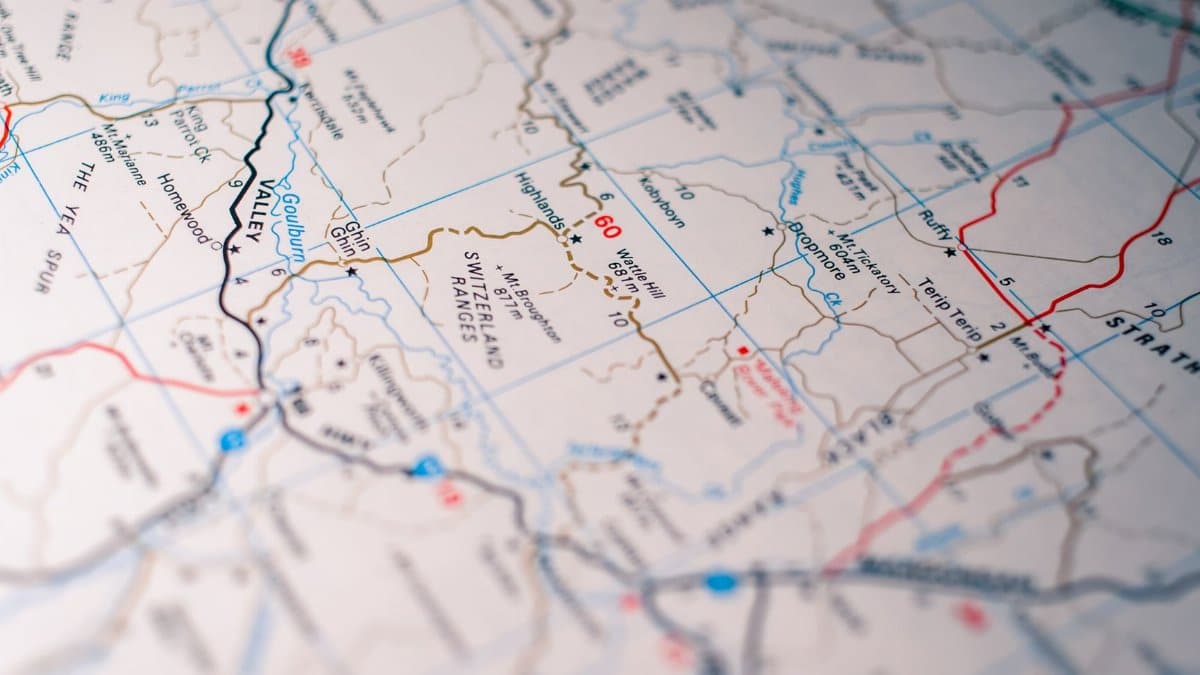 Close-up of a detailed road map highlighting highways and routes.