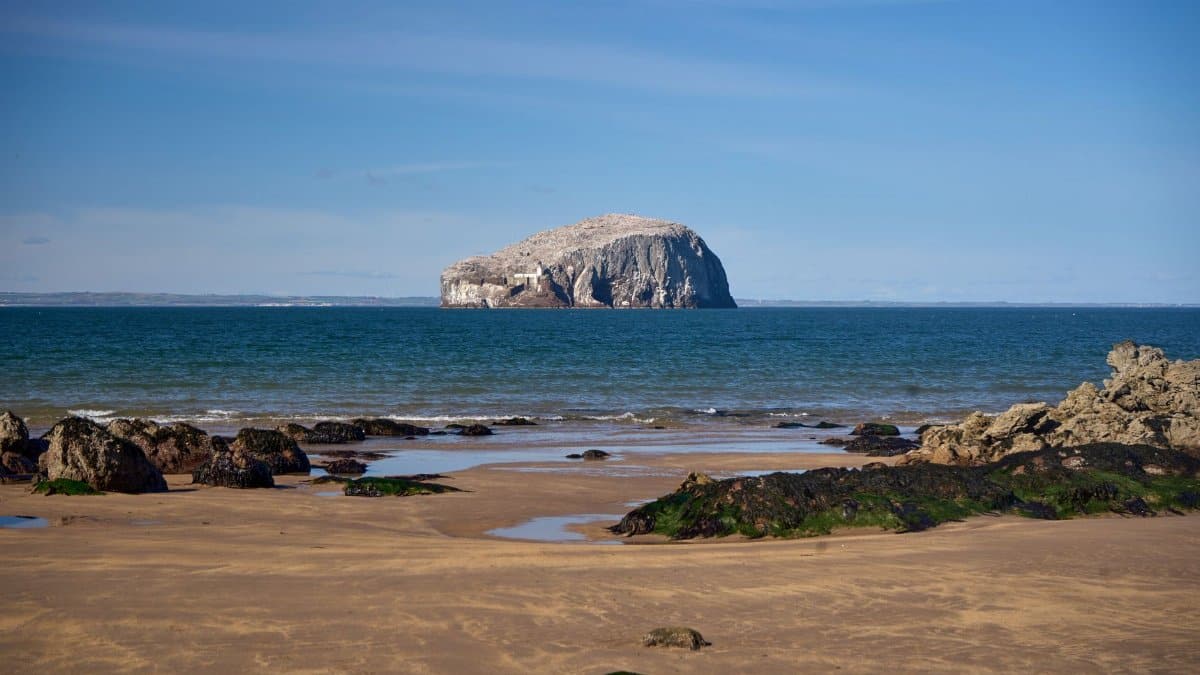 Beautiful view of Bass Rock from Seacliff Beach, Scotland, showcasing the serene coastal landscape.