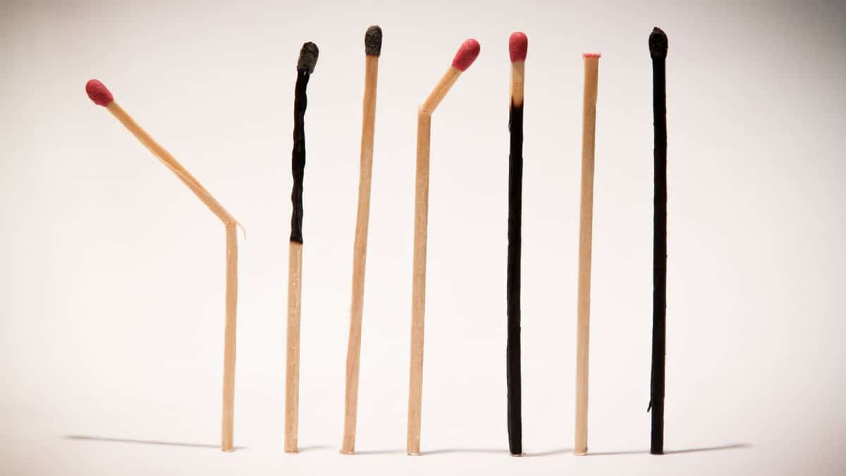 Creative display of matches in various stages of burning, symbolizing transformation.