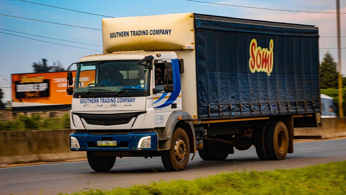 A Southern Trading Company truck drives along a highway in Mankayane, Eswatini.