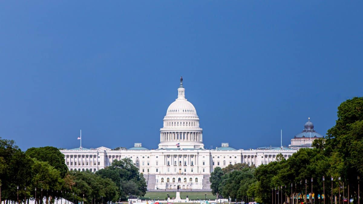 Stunning view of the US Capitol building in Washington D.C. under a clear blue sky.