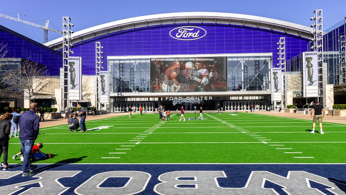 A lively scene at the Ford Center sports venue with people enjoying the outdoors.