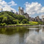 Discover the vibrant skyline of Minneapolis and the serene Mississippi River.