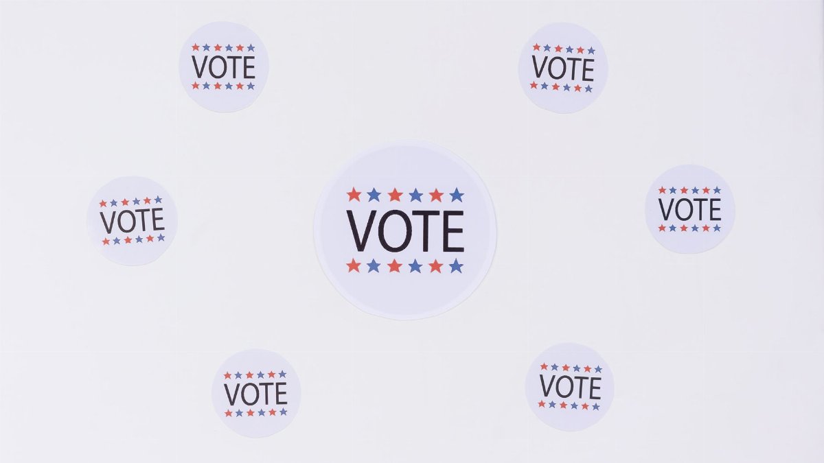 Circular stickers with 'Vote' text and stars emphasizing a voting campaign.