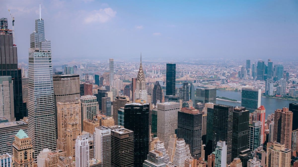 A breathtaking aerial shot of New York City's iconic skyline featuring skyscrapers and modern architecture.