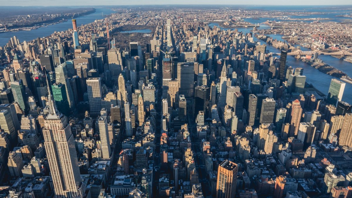 Breathtaking aerial photograph of New York City skyline with iconic skyscrapers and urban landscape.