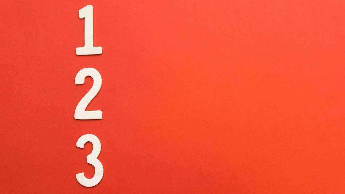 Counting numbers 1 to 3 on a vibrant red background, ideal for design projects.