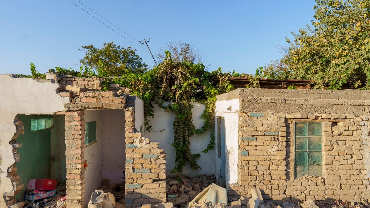 An abandoned brick building in Samarkand representing urban decay and potential redevelopment.