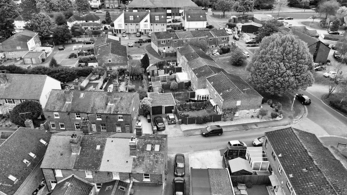 Aerial black and white photo capturing a suburban area in Datchet, England.
