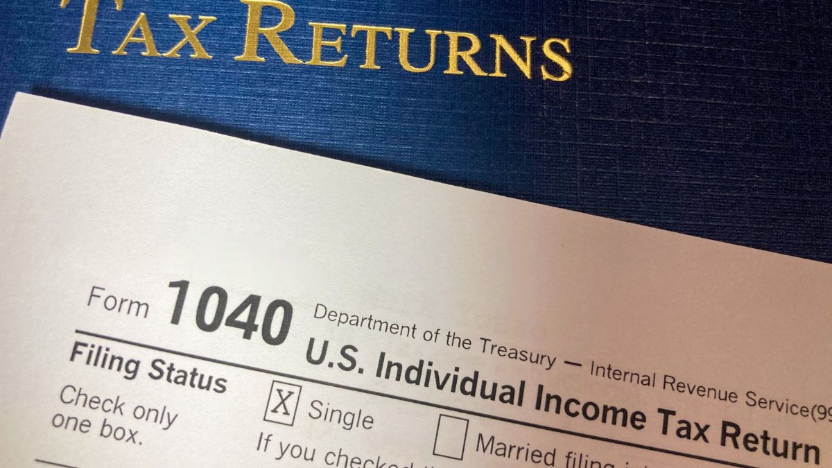 Close-up image of Form 1040 for U.S. tax returns, highlighting filing status options.