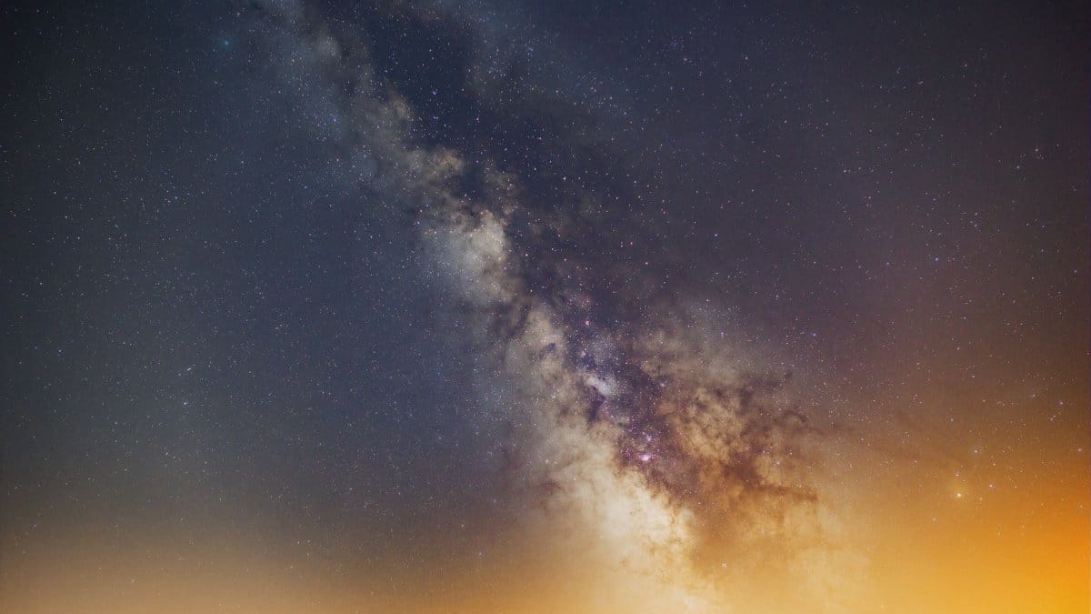Captivating Milky Way galaxy against a vibrant night sky, showcasing cosmic wonders.