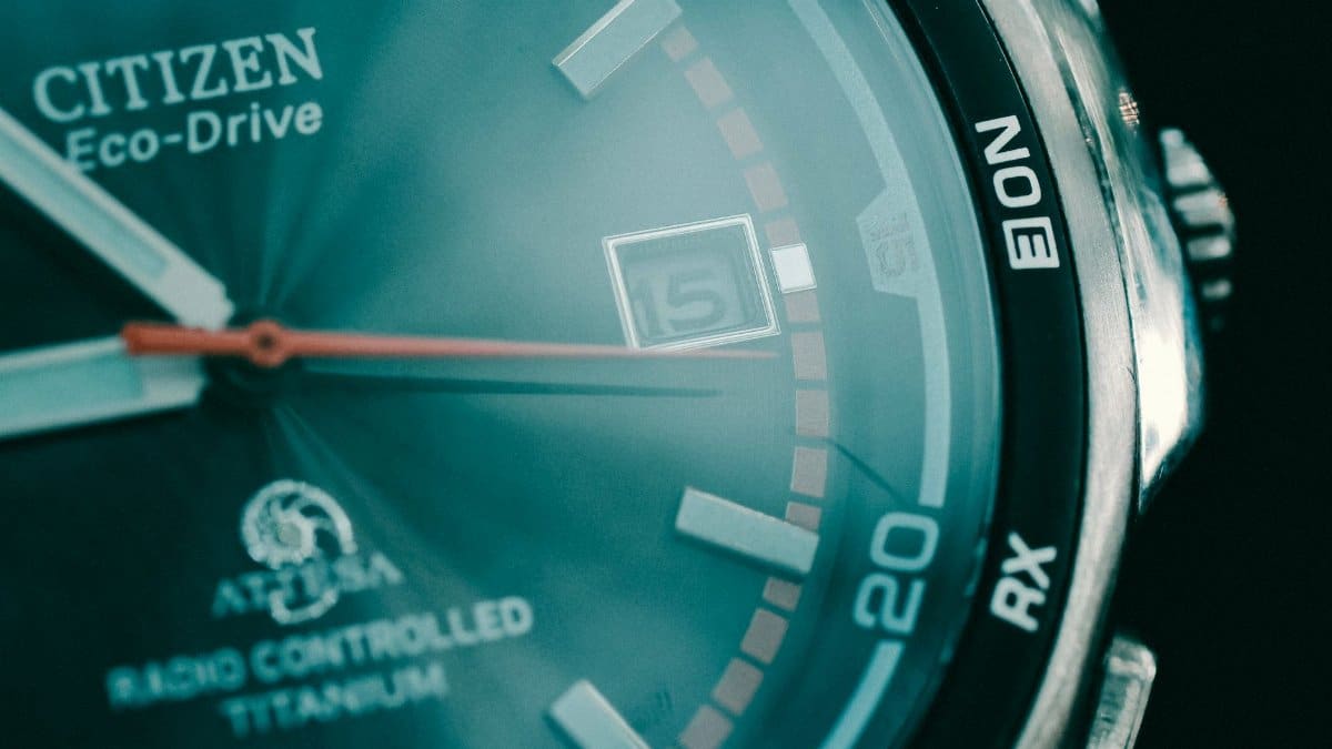 Macro shot of a Citizen Eco-Drive watch showcasing dial details and date feature.